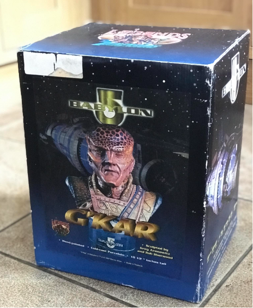 Box of Babylon 5 G'Kar figure on a tiled floor
