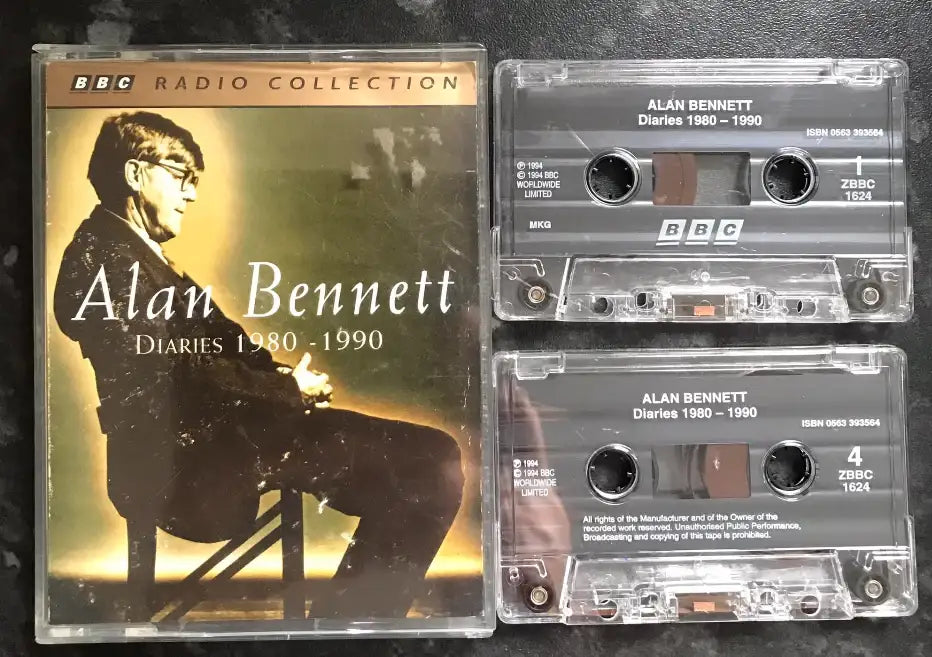 Cassette tapes and cover of 'Alan Bennett Diaries 1980-1990' from BBC Radio Collection on a dark background.