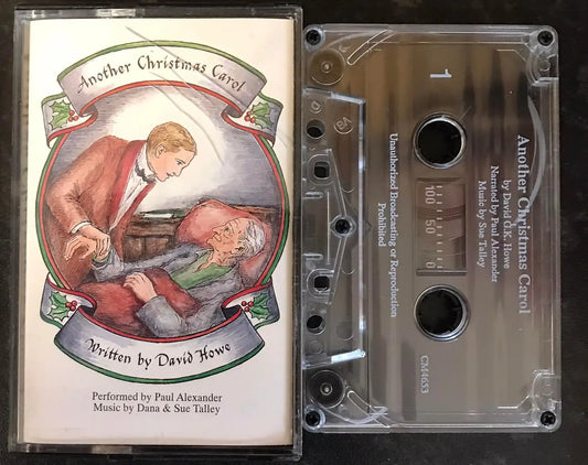 Vintage "Another Christmas Carol" cassette with illustrated cover and clear tape.