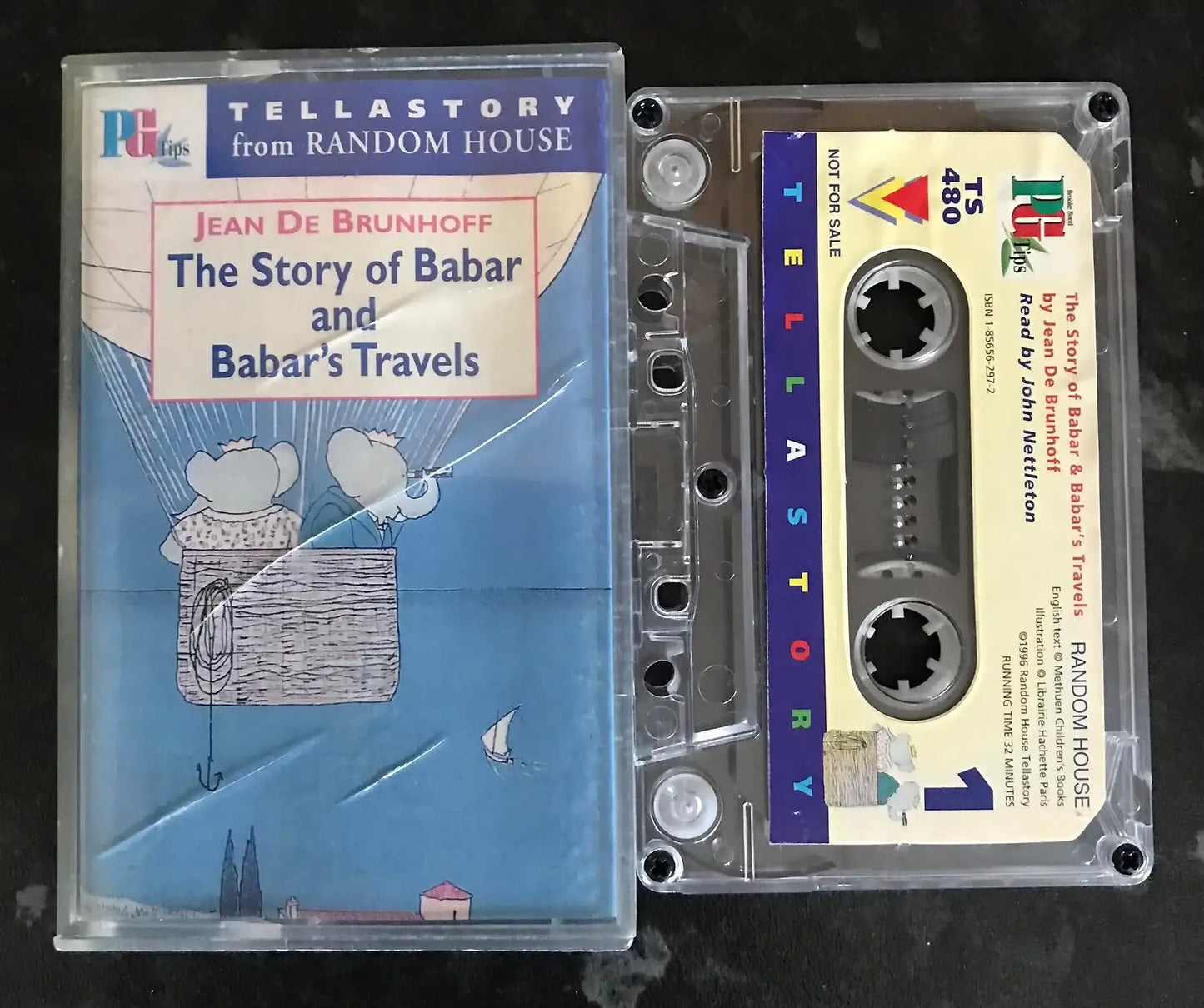 Vintage Tellastory "The Story of Babar" cassette with clear case and colorful label.
