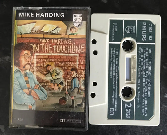 Vintage Mike Harding "On The Touchline" Philips cassette with colorful cover art and white tape.