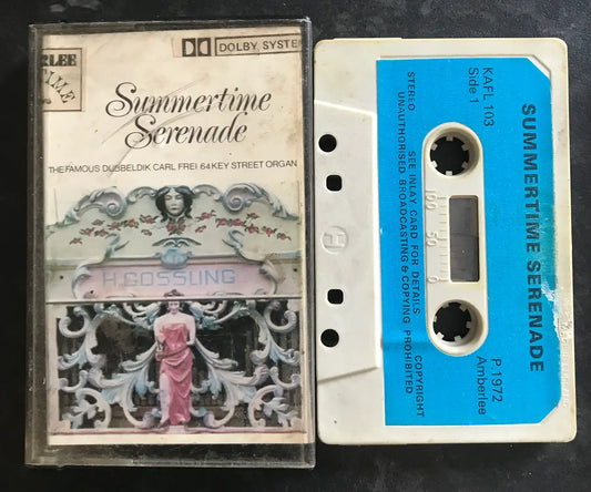 Vintage "Summertime Serenade" cassette with ornate cover art and a white tape with a blue label.